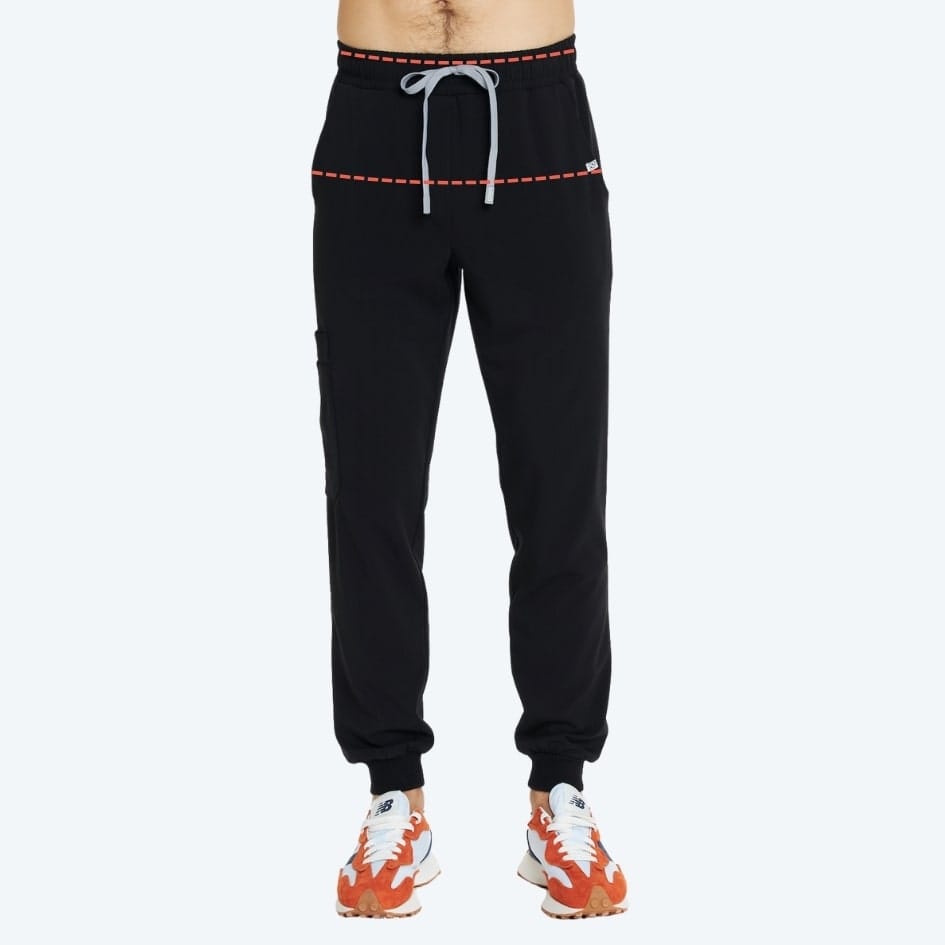 Spodnie medyczne typu jogger w kolorze czarnym z kieszeniami i ściągaczami na nogawkach.