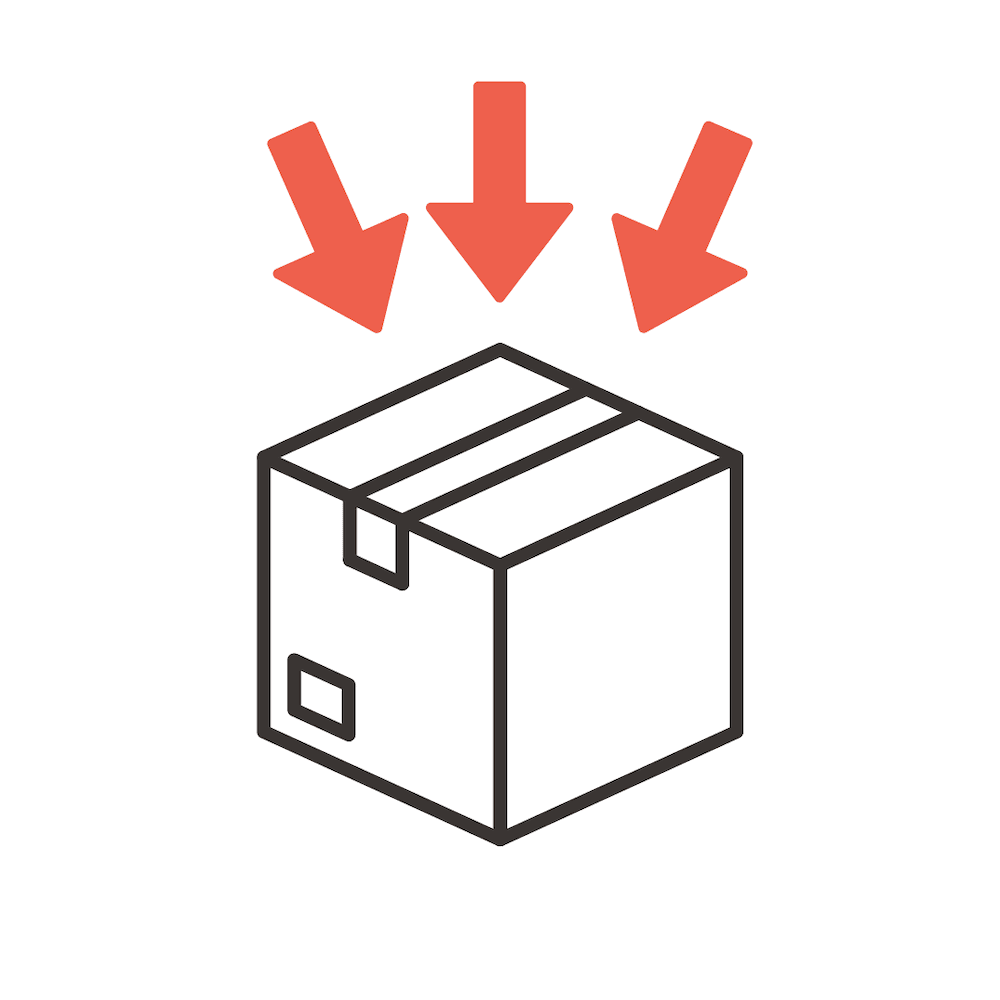 Paczka z trzema czerwonymi strzałkami nad nią