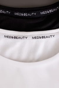 Női orvosi hosszú ujjú fehér